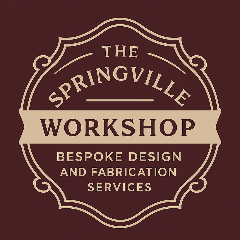 Logo of The Springville Workshop on a dark red background