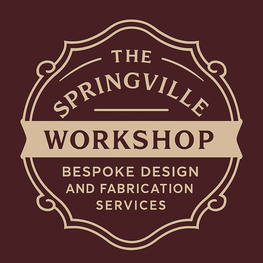 Logo of The Springville Workshop on a dark red background